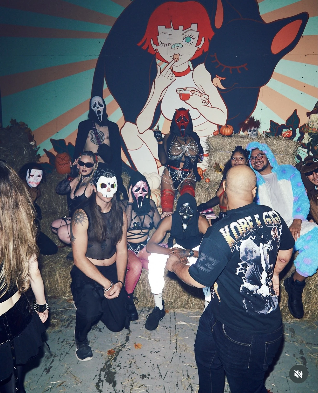 Halloween photo area reference with costumes and hay bales